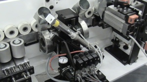 Автоматический односторонний кромкооблицовочный станок. Модель В10 фирма PAOLONI, Италия.