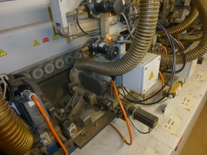 Односторонний кромкооблицовочный станок OPTIMAT KDF 760 C Brandt