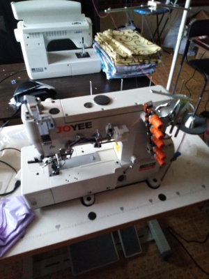 Плоскошовную швейную машинку