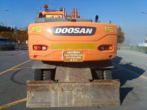 Колёсный экскаватор Doosan DX140W Ace 2015 года