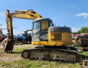 Экскаватор Komatsu PC228US-3, 2007 года выпуска, рег. знак 7501ВТ25, зав. № РС228-020427, цвет: жёлтый-серый