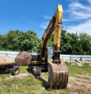 Экскаватор Komatsu PC228US-3, 2007 года выпуска, рег. знак 7501ВТ25, зав. № РС228-020427, цвет: жёлтый-серый