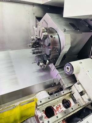 Токарный центр с ЧПУ TBI TC 200-65 MC