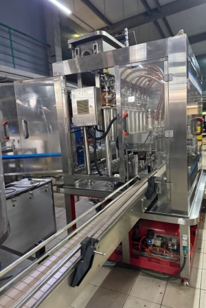 Поршневой станок розлива 0,5 - 5,5 литров