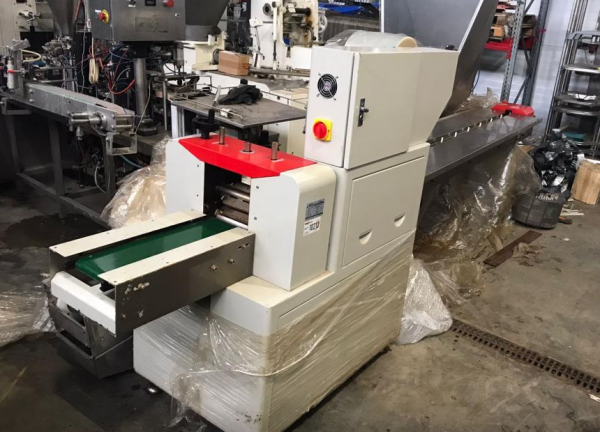 Горизонтальный упаковщик Hualian DXDZ-250B