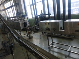 Машина для автоматического нанесения термоусадочных этикеток на конические стаканы TADBIK