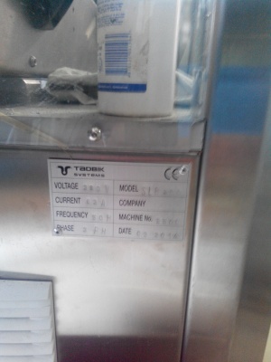 Машина для автоматического нанесения термоусадочных этикеток на конические стаканы TADBIK