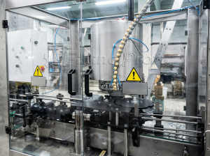 Автомат укупорочный роторный Камю, 7000 бут/ч