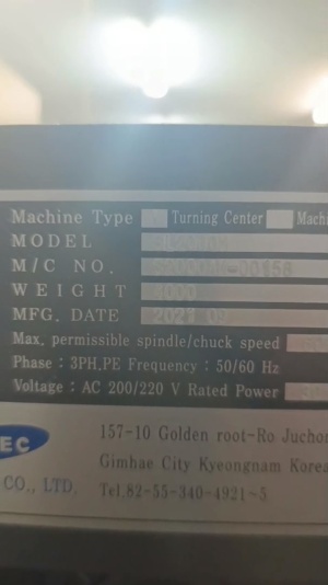 Cтaнок токaрнo-фрeзeрный SMEC SL2000AM с устройством подачи прутка Fedek DH65L-S2