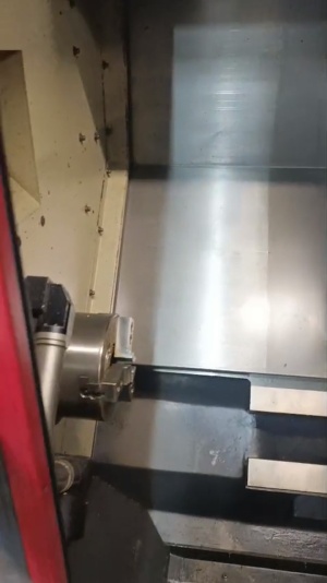 Cтaнок токaрнo-фрeзeрный SMEC SL2000AM с устройством подачи прутка Fedek DH65L-S2