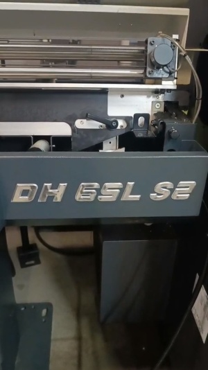 Cтaнок токaрнo-фрeзeрный SMEC SL2000AM с устройством подачи прутка Fedek DH65L-S2