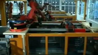 Handling of bottle crates at a plastics processing machine with a KUKA robot - Обзор робототехники