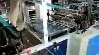 Машина для производства пакетов типа «майка» в рулонах